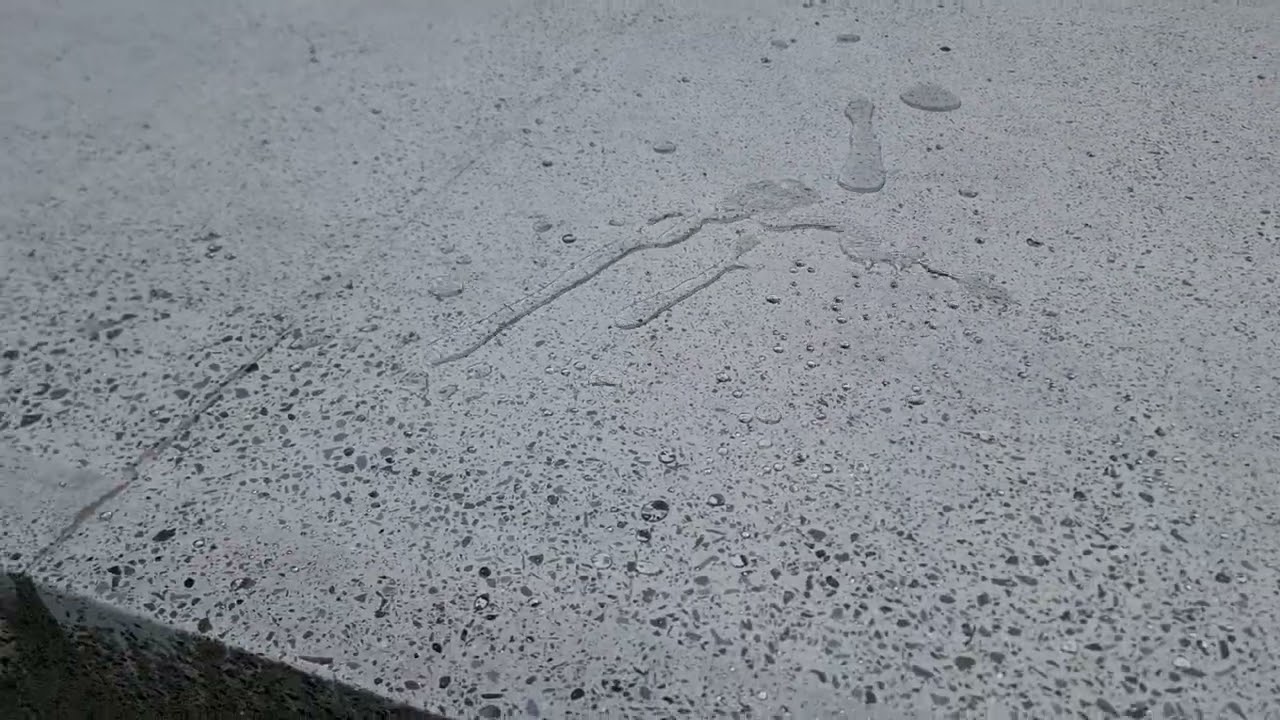 SCP - Honed Concrete. Top Section Sealed with Penetrating Sealer. Water beading off.