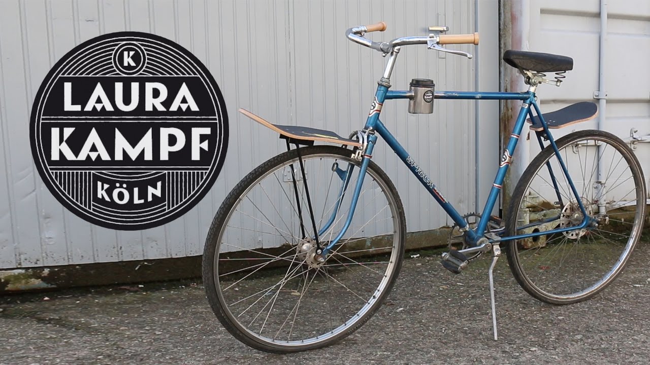 Bicycle Mudguard and Cargo Rack from old Skateboard