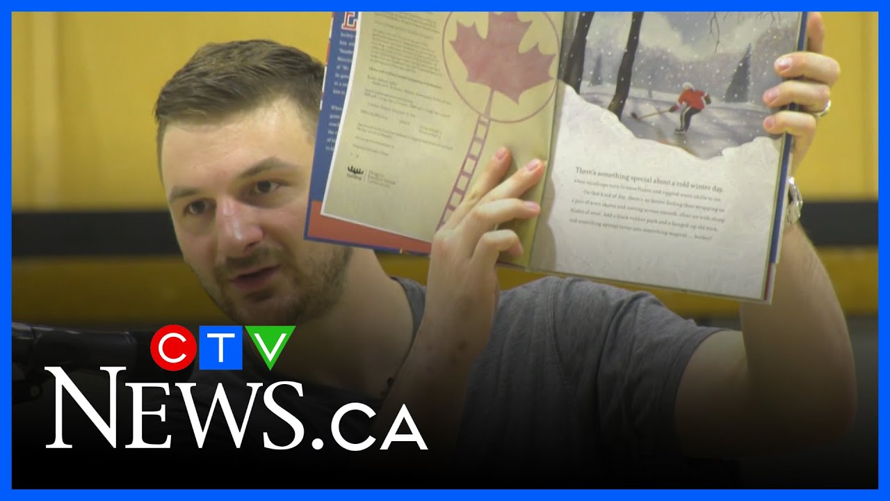 Zach Hyman reads book he wrote to Edmonton students