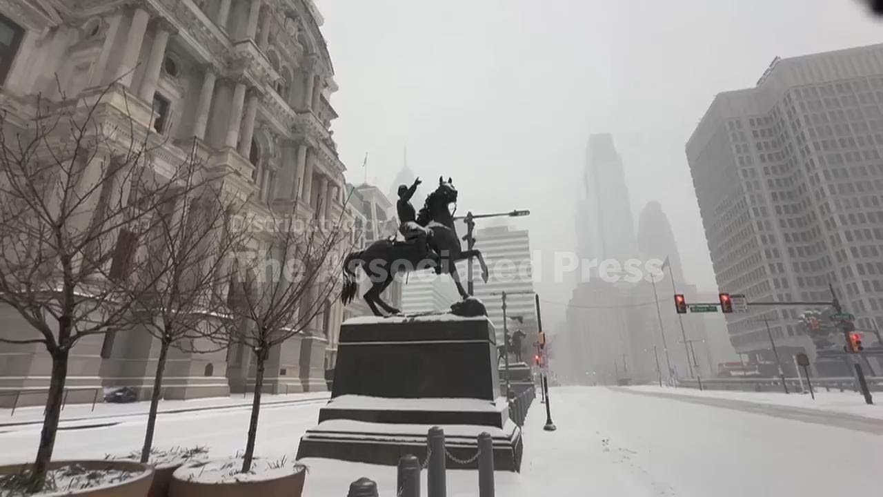Heavy snow falls on Philadelphia as winter storm hits U.S.