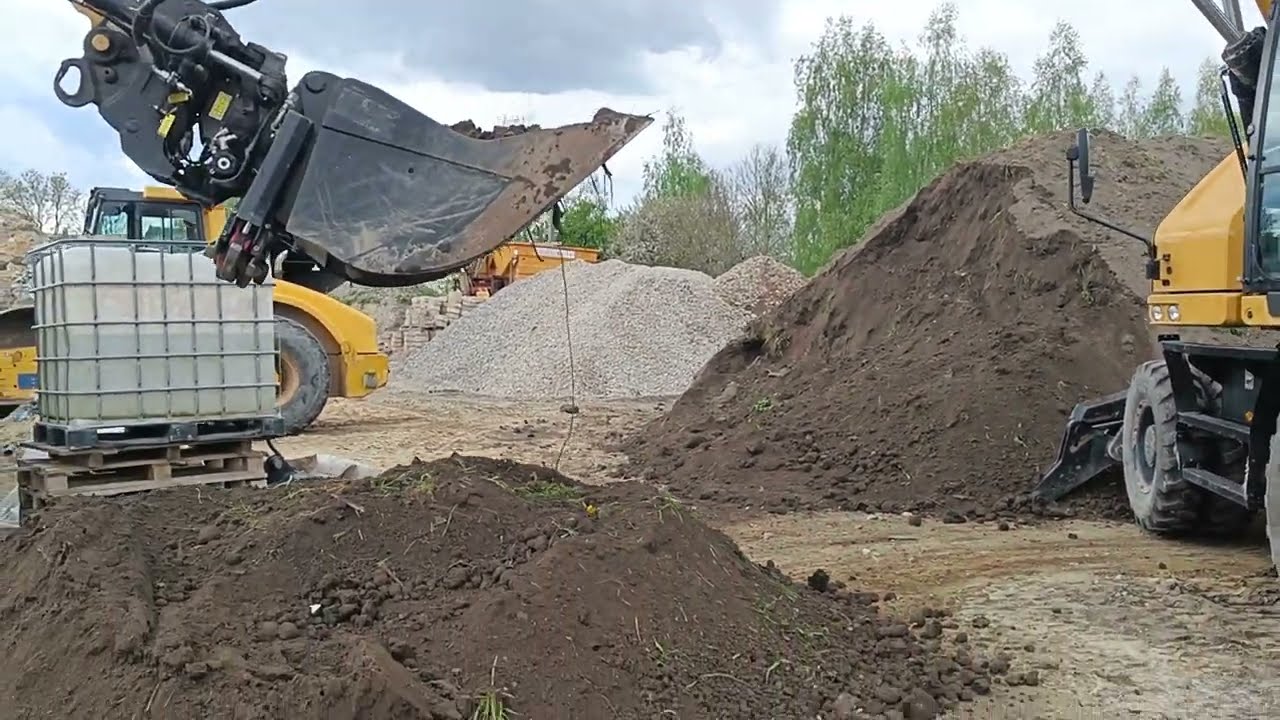 CAT M314 - ażurowa łyżka - I