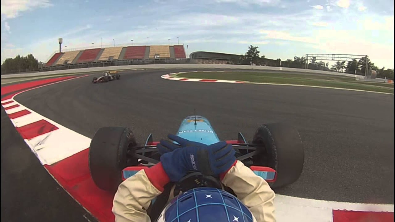 Driving a F1 Benetton B198 at the Catalunyan Spanish Grand Prix circuit near Barcelona.