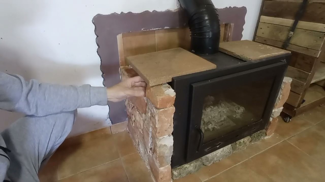 Revestir la CHIMENEA con PIEDRA NATURAL.