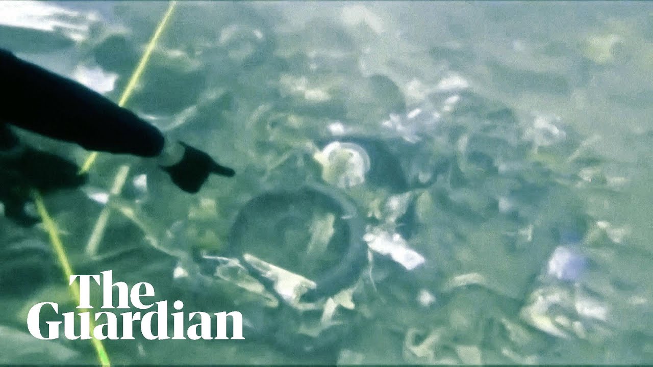 Indonesia plane crash: divers search for black boxes in debris of Sriwijaya Air flight SJ 182