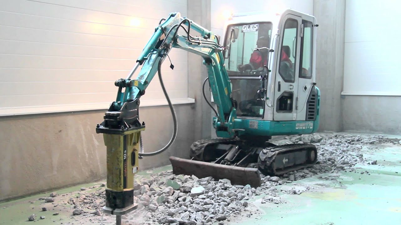 GLES Oy - Sunward SWE 17B kaivinkone, piikkaus. Demolition with excavator