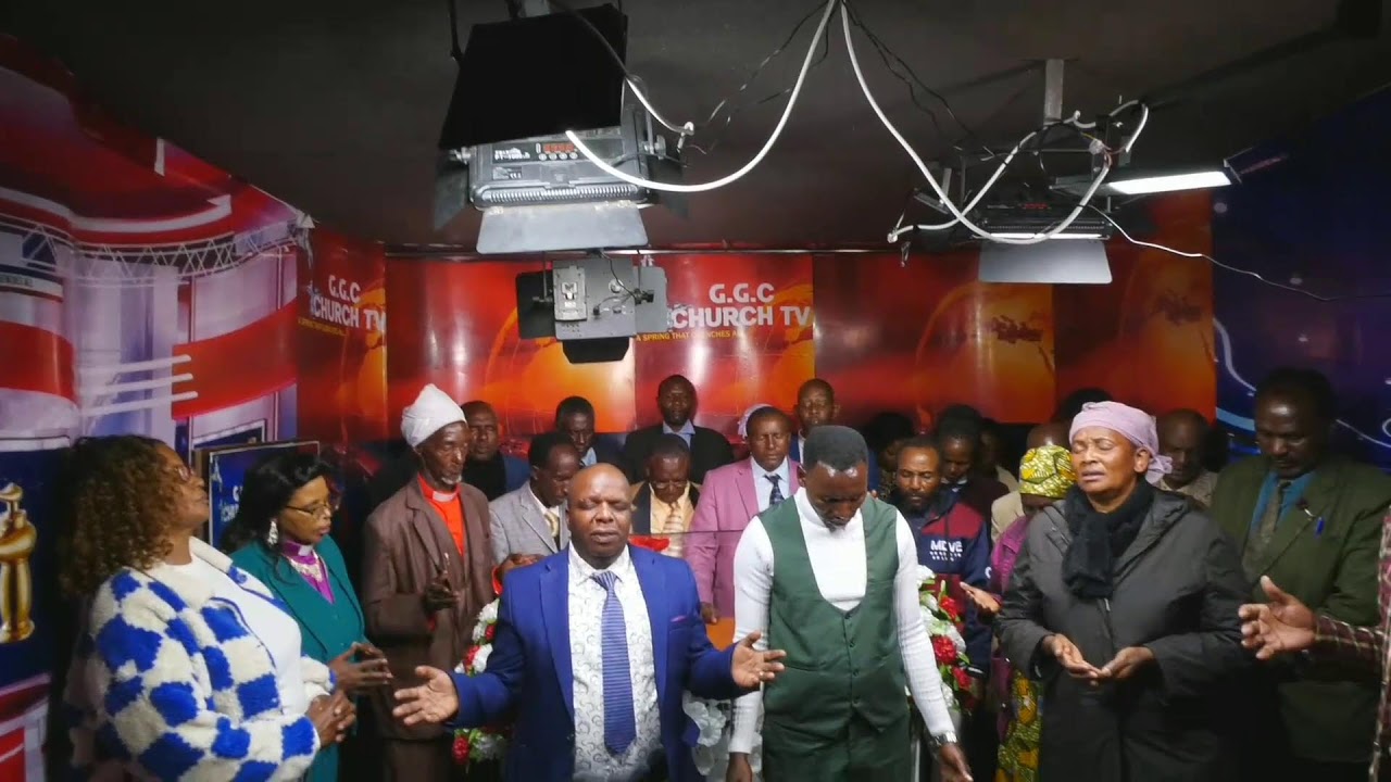 Bishop Rahab in studio with priesthood