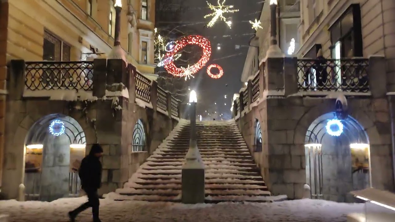 Walking around snowy old town Ljubljana, capital of Slovenia 