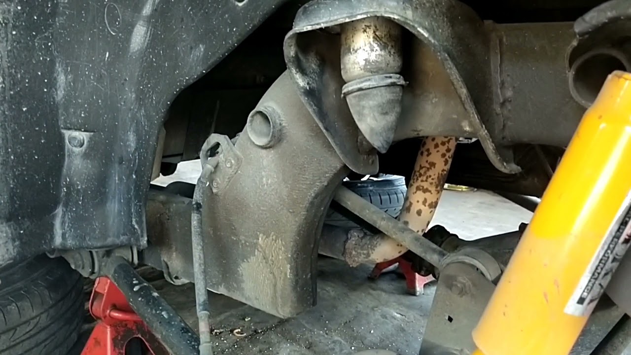 cara menaikan suspesi mobil