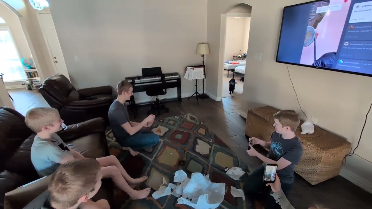 Hank-iversary.  8 years ago today we brought him home as a new puppy.  He's opening his gifts. 