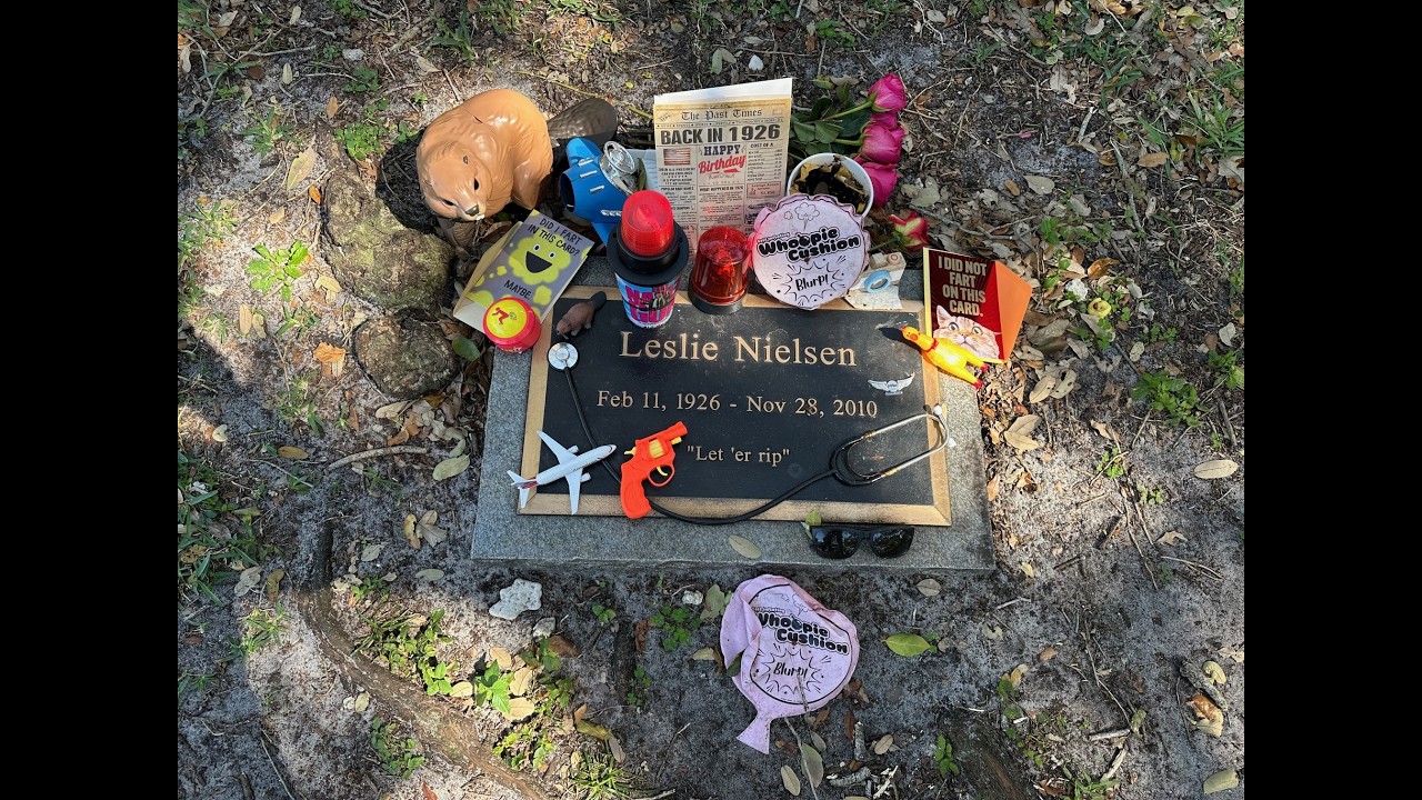 Celebrating Leslie Nielsen's 100th Birthday at his fart joke-inscribed grave with Naked Gun beaver!