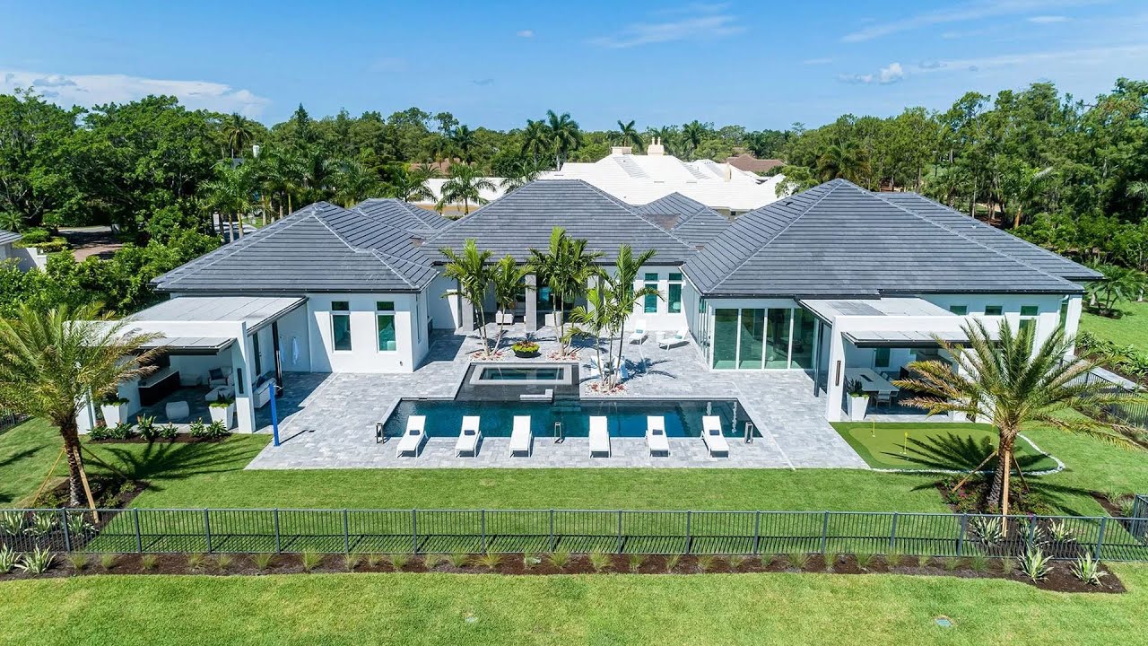 $5,900,000! Impeccably unprecedented estate in Naples features the luxury resort lifestyle