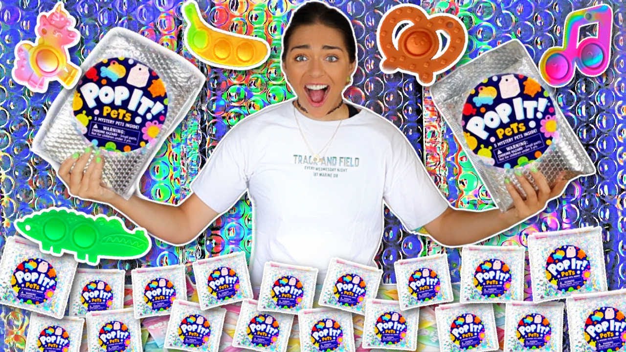 OPENING 50 POP IT PETS!!😱😱😱 *never seen before*