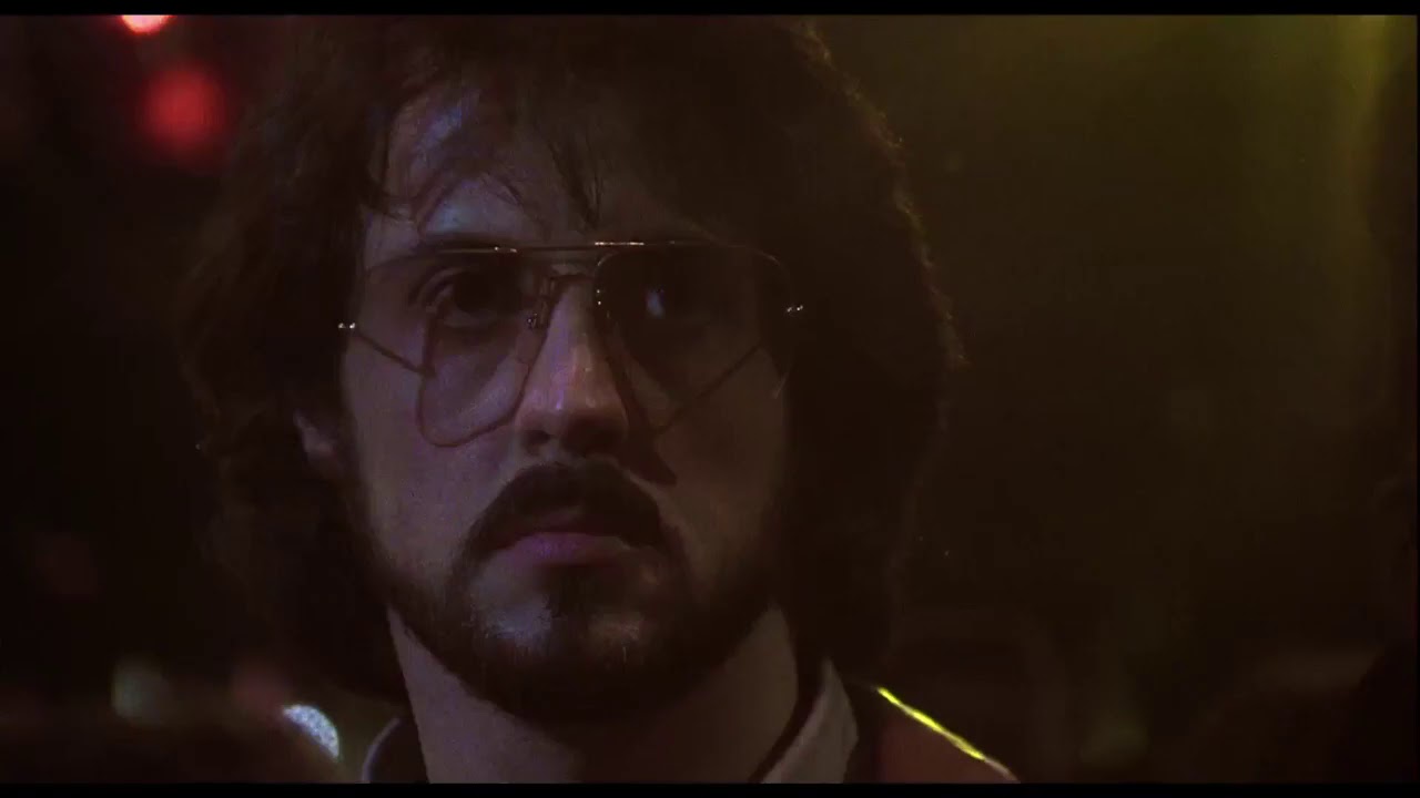 Sylvester Stallone and Rutger Hauer lock eyes to In Your Eyes by Peter Gabriel