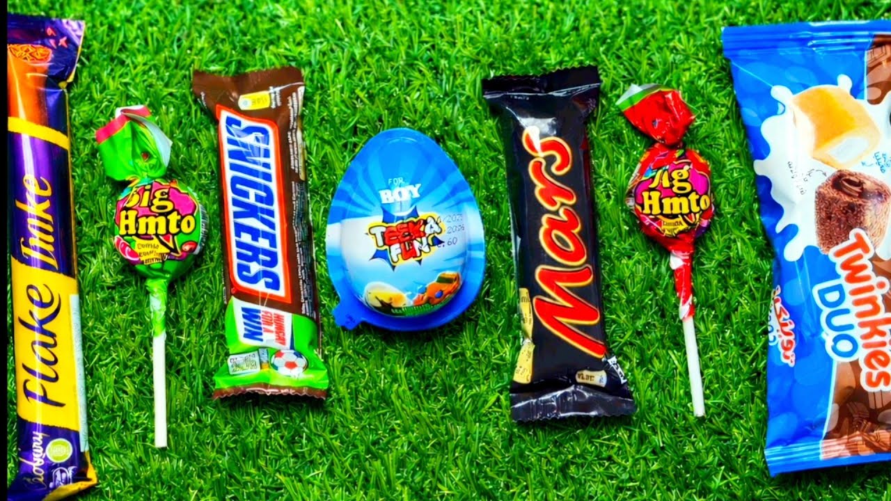 Most Asmr popular candys some lots of colorful rainbow lollipop candy unpacking chocolate eat