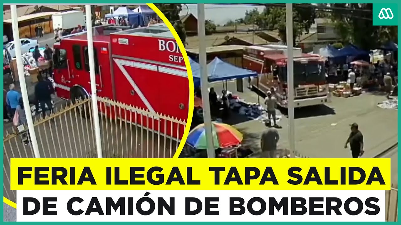 Feriantes ilegales bloquean la salida de carro de emergencias de bomberos