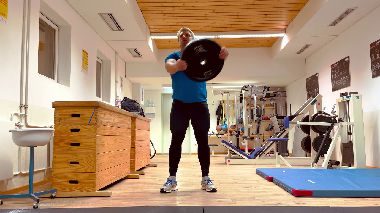 Figure Eight Turns With A Weight Plate - Weight Plate Exercises by Tristan Schwandke