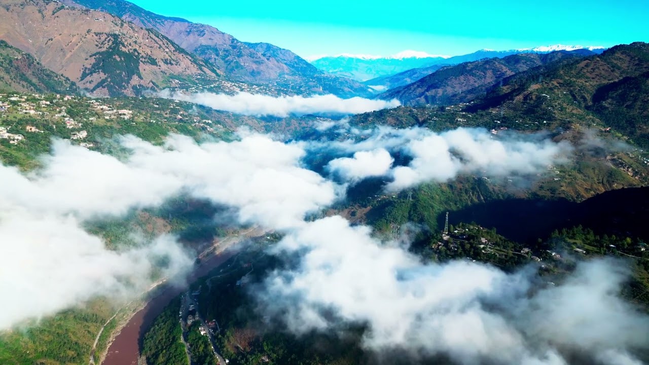 Aerial Whispers: Above the Clouds in Post-Rain Fog