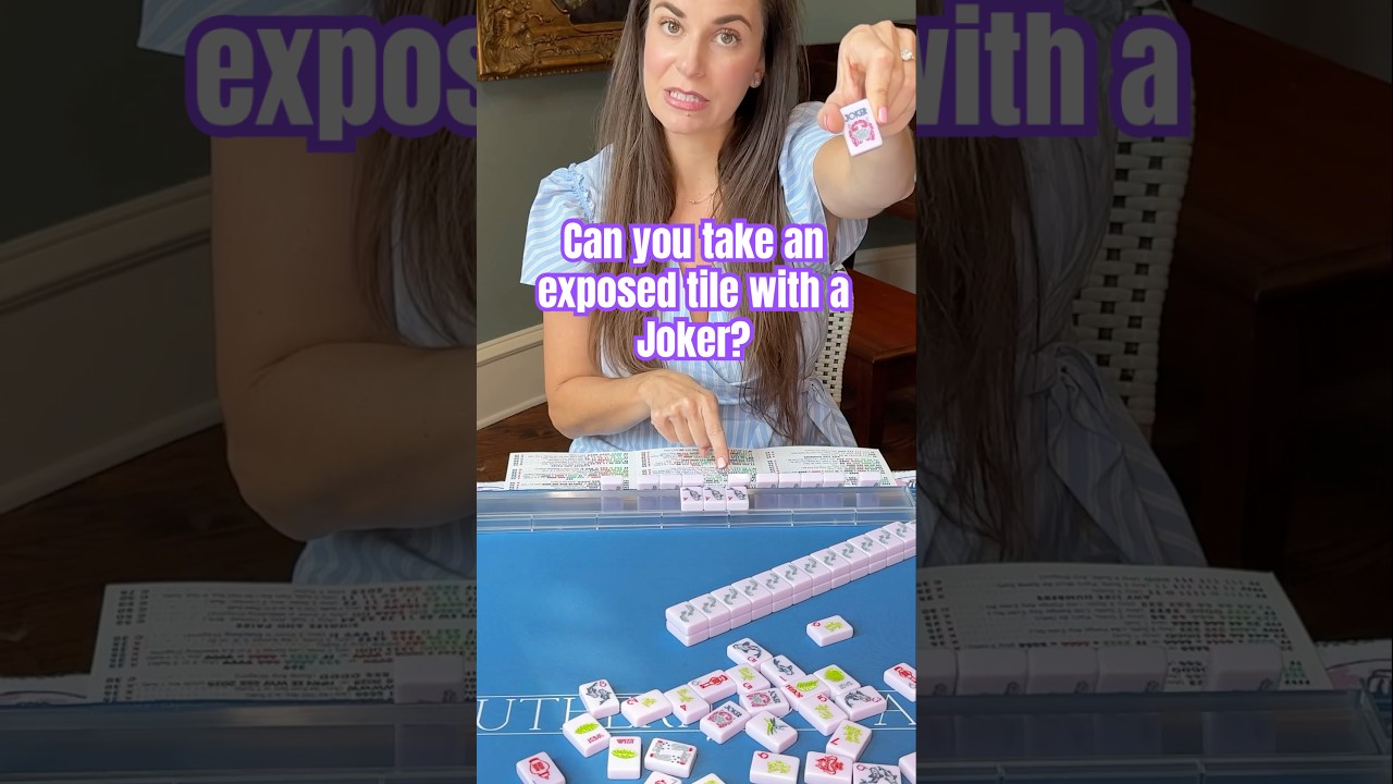 Can you take an exposed tile with a Joker in American mahjong?