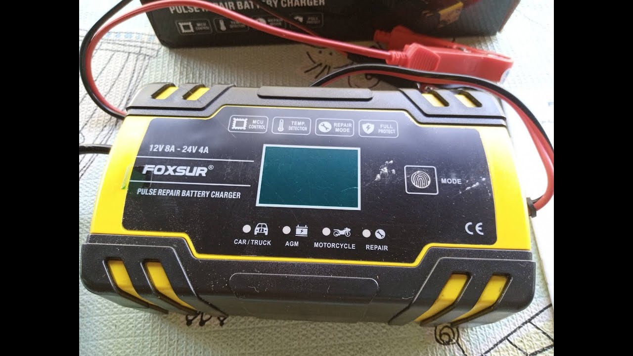 Amorphous solar panel with switching battery charger