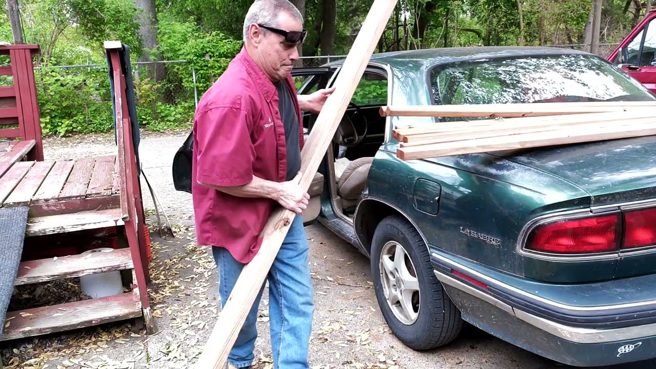 94 Buick unloading lumber