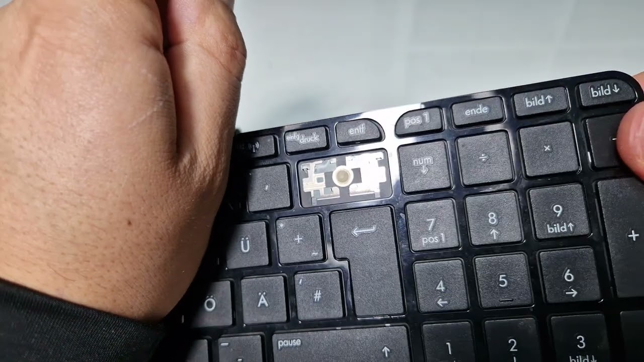 Cómo reparar o reemplazar la tecla de retroceso en un teclado de computadora portátil | Guía fácil