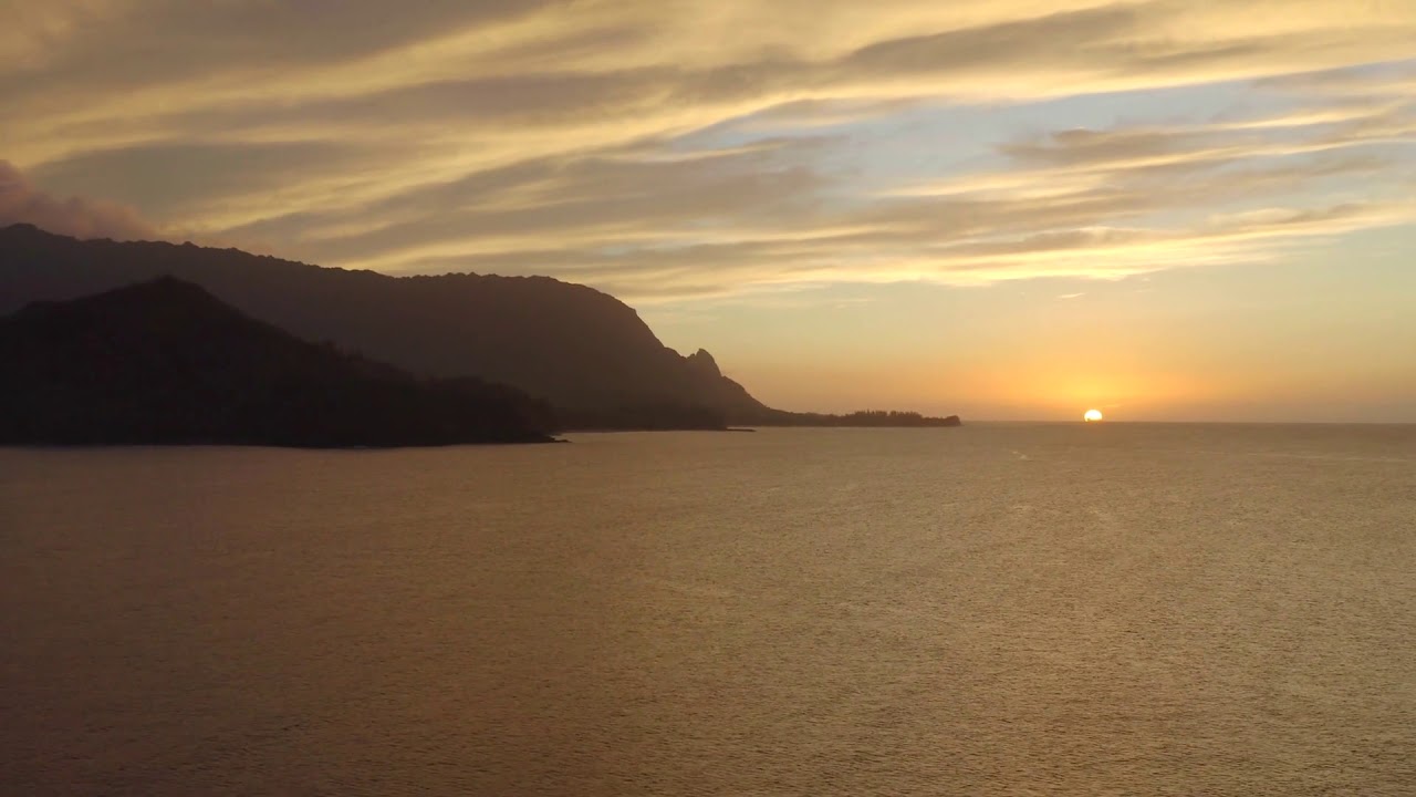 hanalei bay mountains at sunset kauai hawaii by aerial drone view