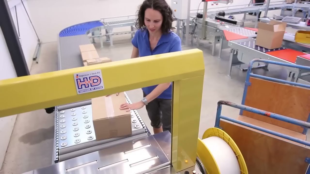 Verpackungsanlage mit Packtischen im XXL-Format von H+D