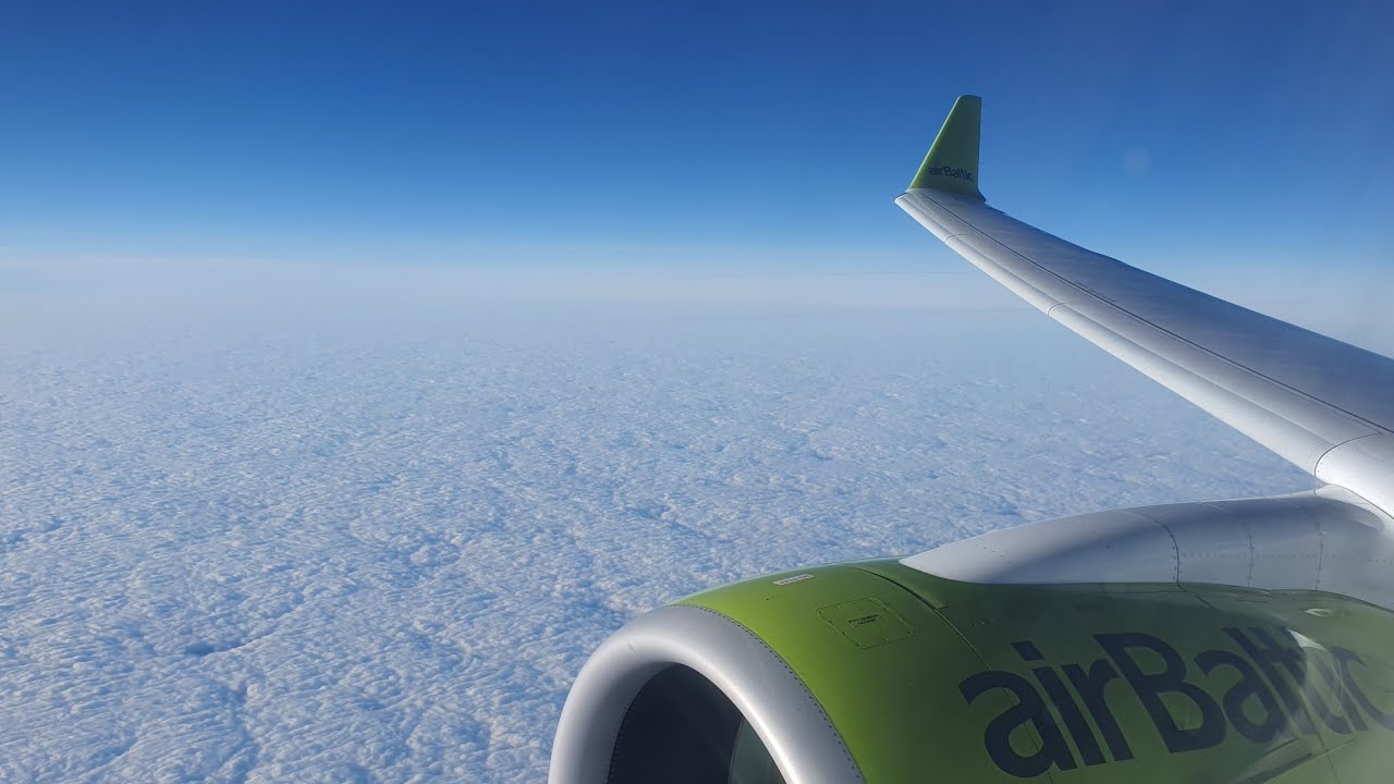 YL-CSJ Airbus A220 of Air Baltic from Guernsey to Gran Canaria 30.12.2025 (Estonian Flag Livery)