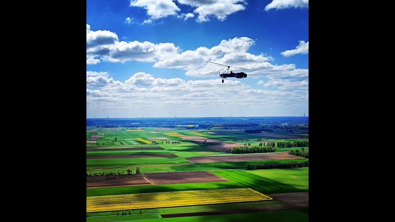 Fusioncopter JK-3 Juan gyrocopter over Liw river. Cockpit view.
