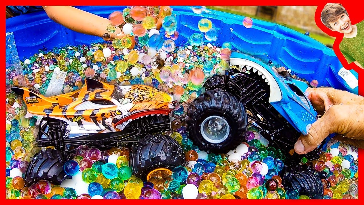 Monster Trucks Riding In Orbeez!