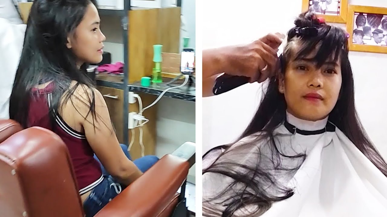 Gorgeous model looks worried in the barber's chair
