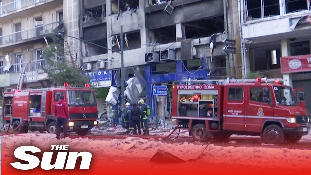 Firefighters tackle blazing fire after huge blast destroys buildings in Athens