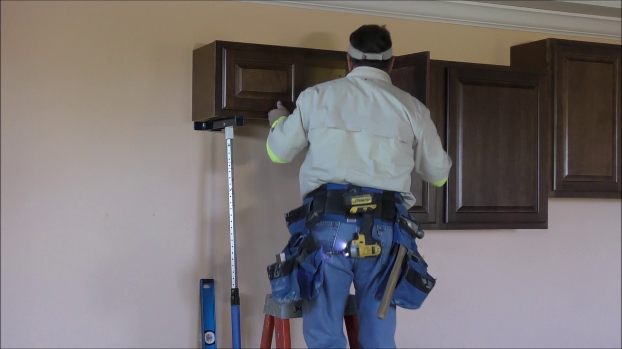 How to install kitchen wall cabinets and Crown Moldings with the Pinch Prop cabinet jacks
