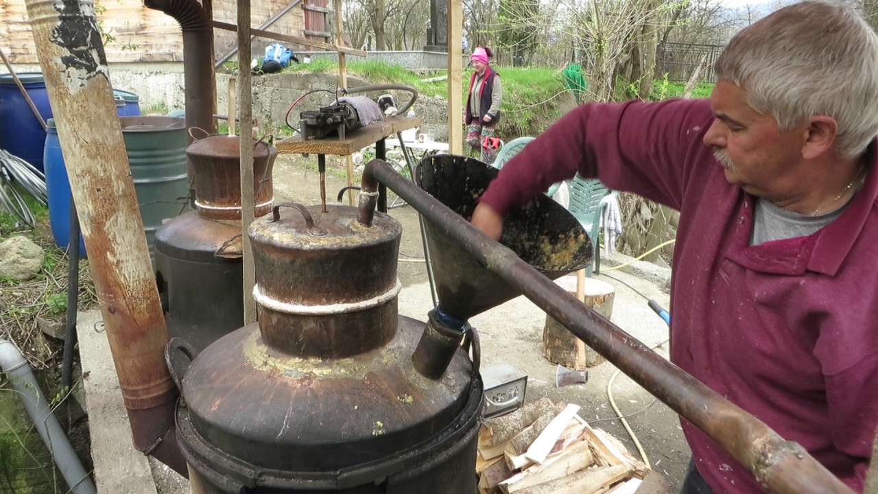 Palinka  or  Țuică distilling in Maramures, Romania Part 3