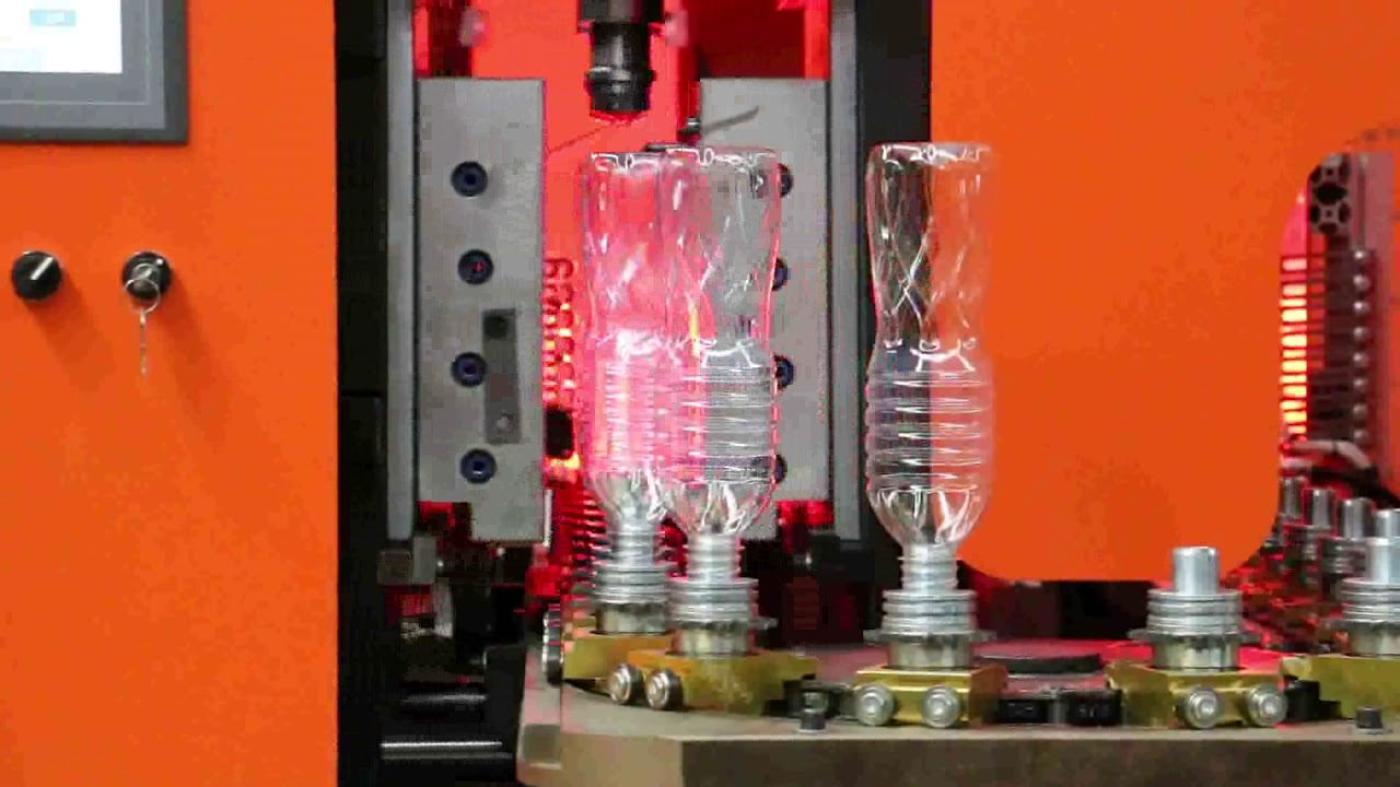 Hand feeding PET bottle blowing machine