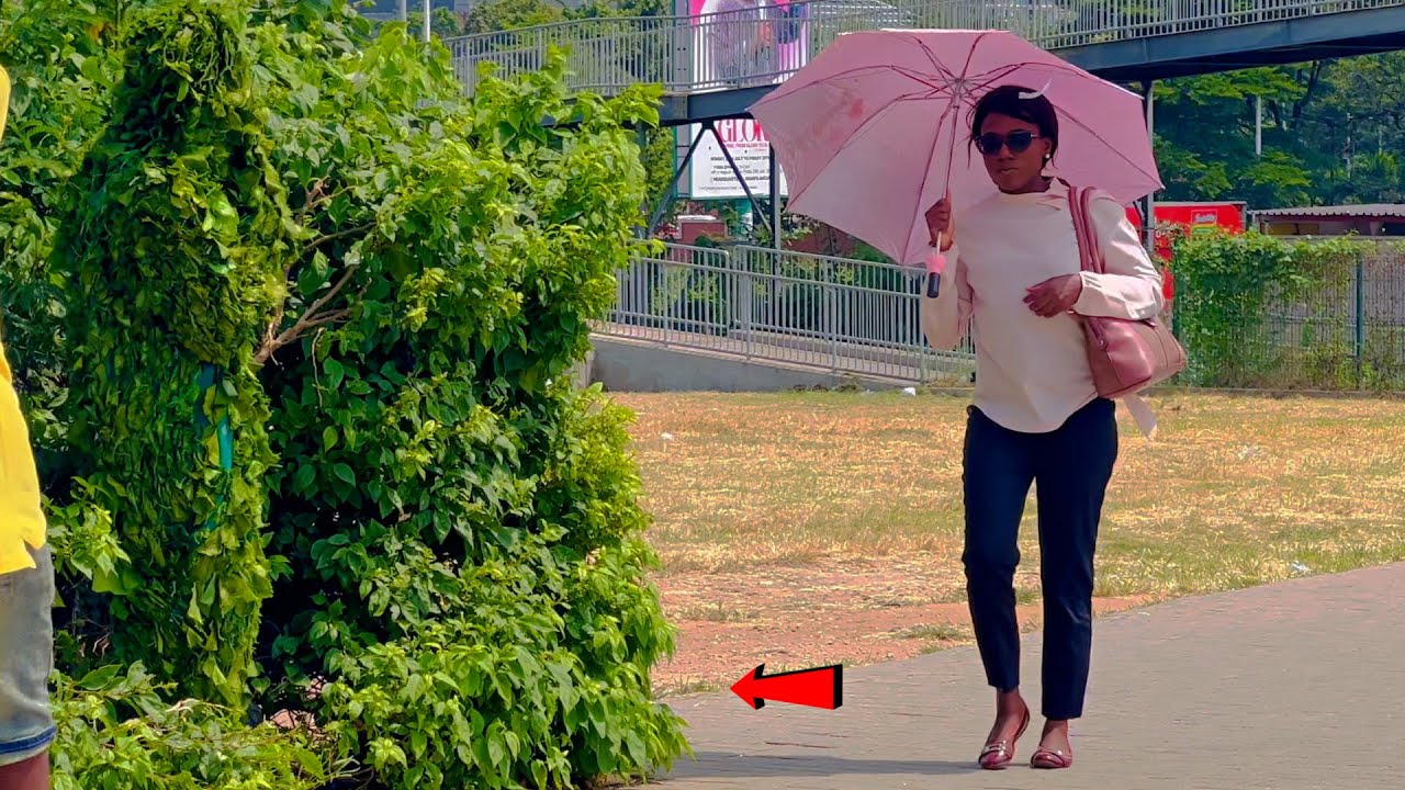 She Almost hit Bushman with her Umbrella. Bushman prank!