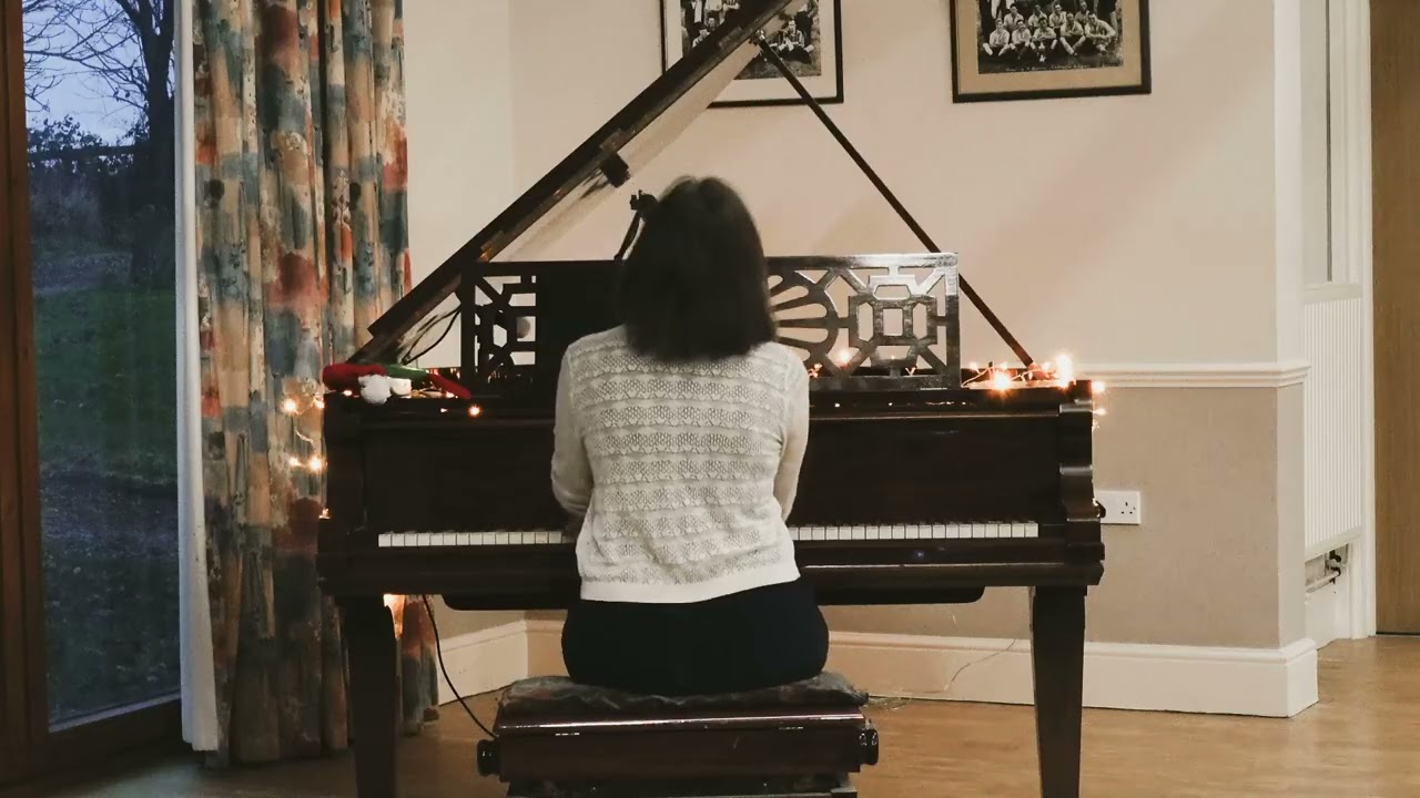 'Christmas Time is Here', by Vince Guaraldi. Performed live.