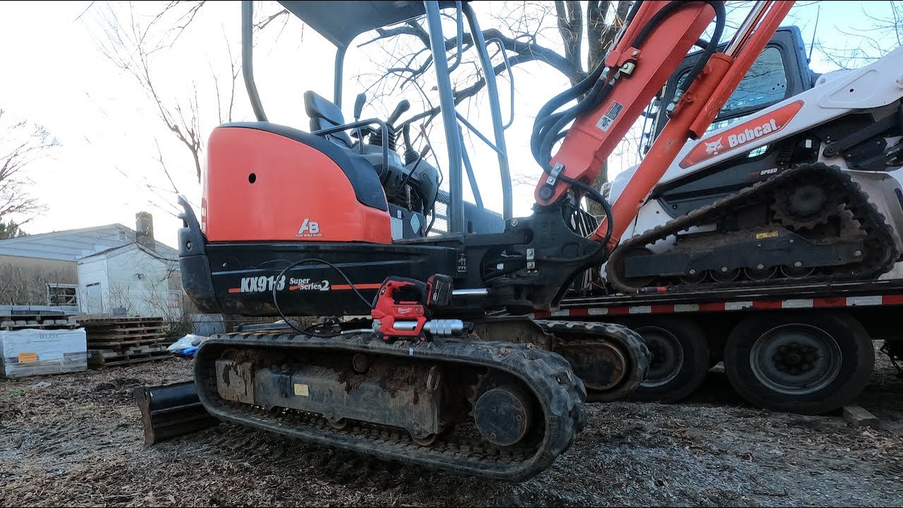 Mini excavator track tension
