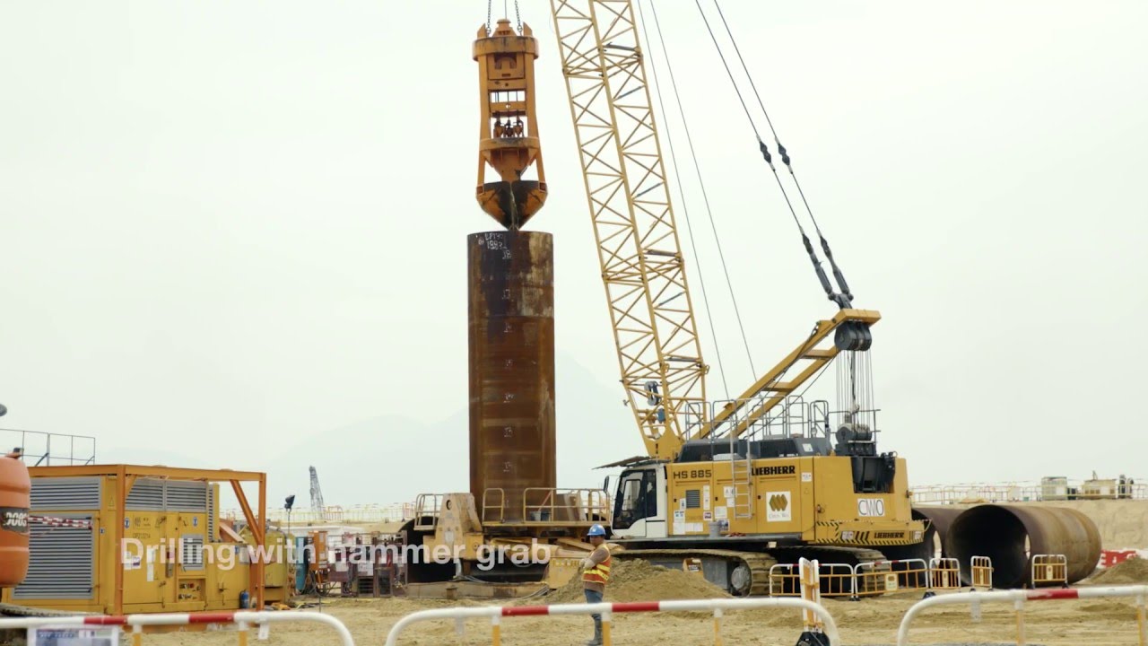 Liebherr - Drilling with hammer grab