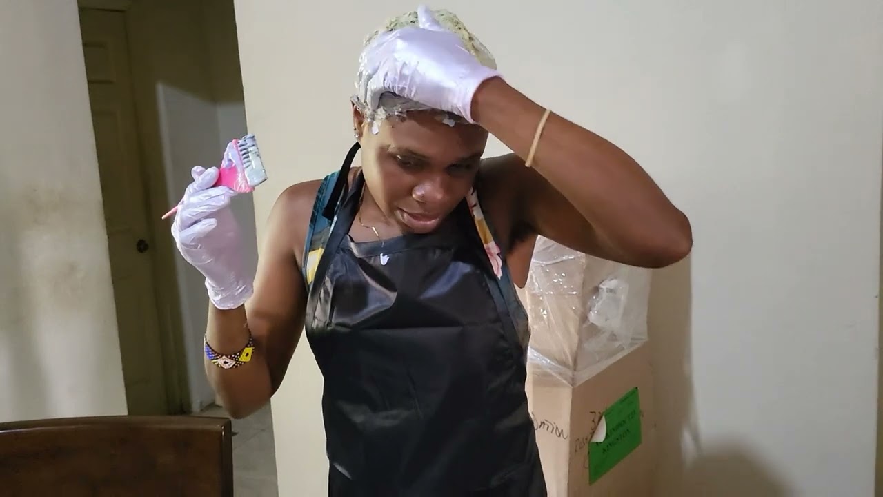 doing my own hair after unboxing my hair products that my lovely subscriber send down for me .