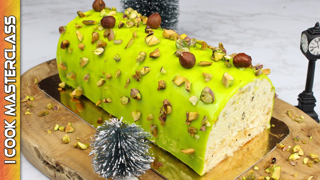 ✅ LA BUCHE DE NOEL MOUSSE DE PISTACHE MOUSSE DE NOISETTE ET BISCUIT LORRAIN DE CHRISTOPHE FELDER