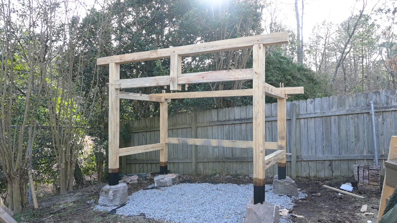 Building a timber frame woodshed that is scribed to stone