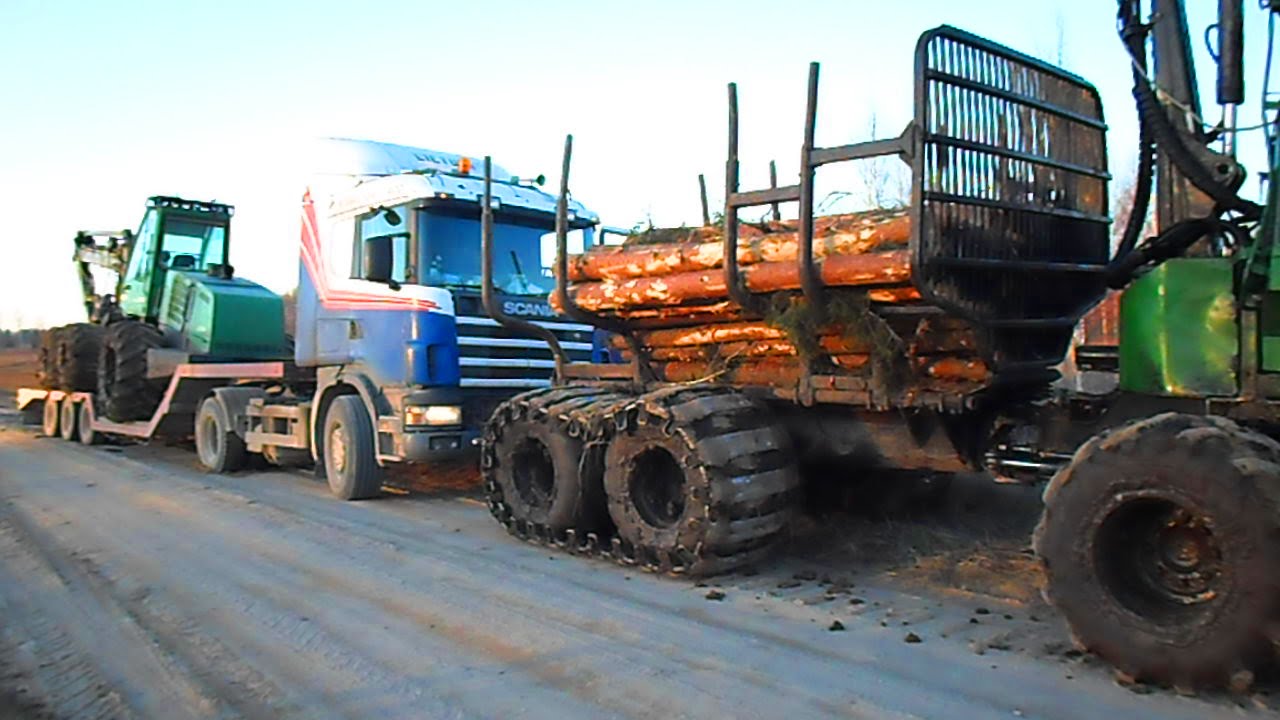 Forwarder John Deere 810D, harvester John Deere 1270D and Scania 124 truck, difficult road