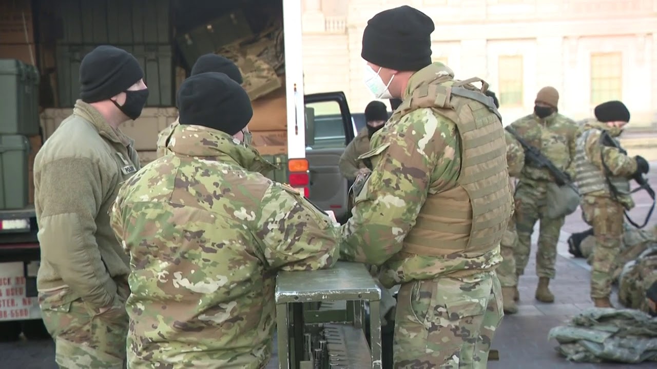 National Guard members in Capitol receive weapons