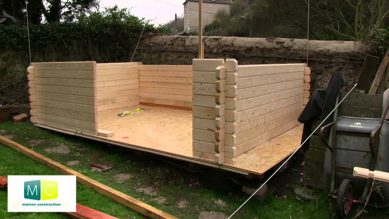 Montage chalet de jardin en bois madriers