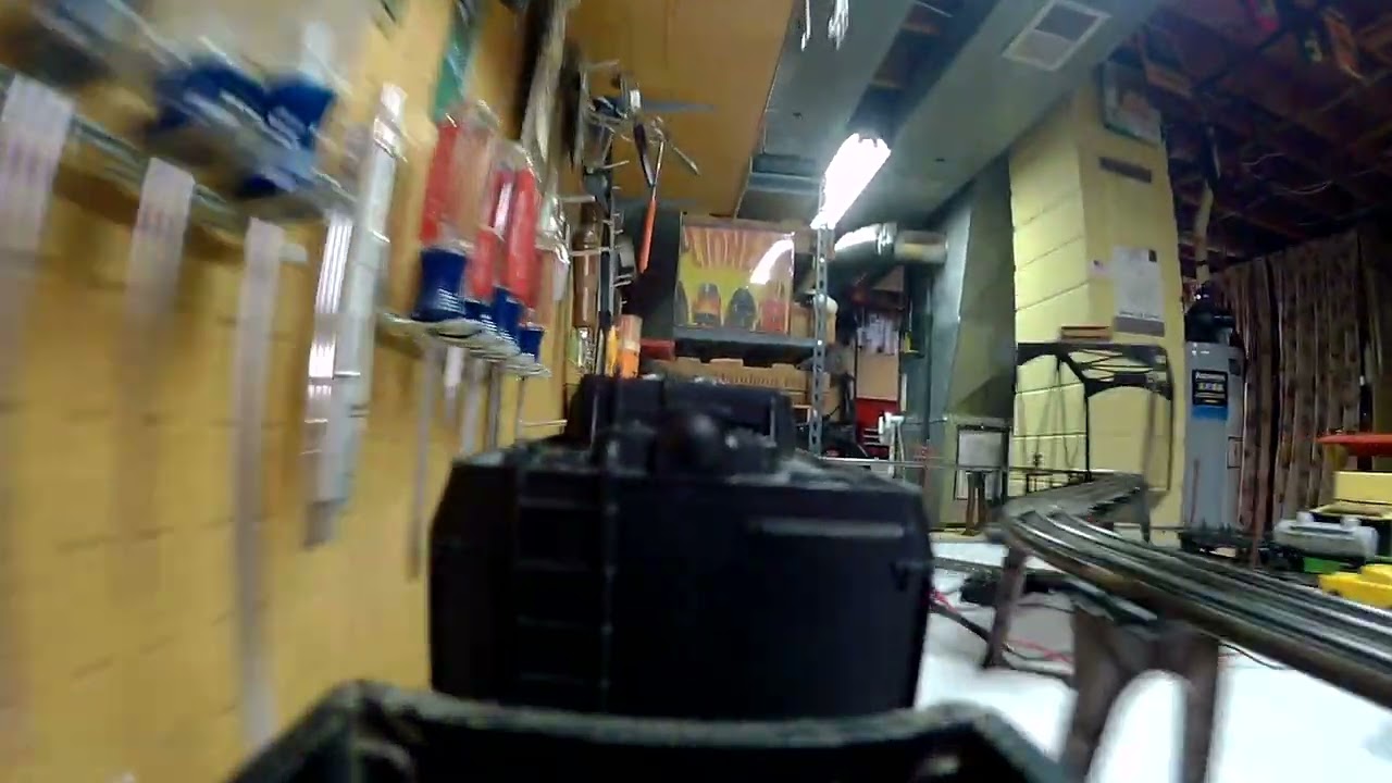 Cab ride on a Lionel postwar 4x8 smoking steam train set with whistle and trestles