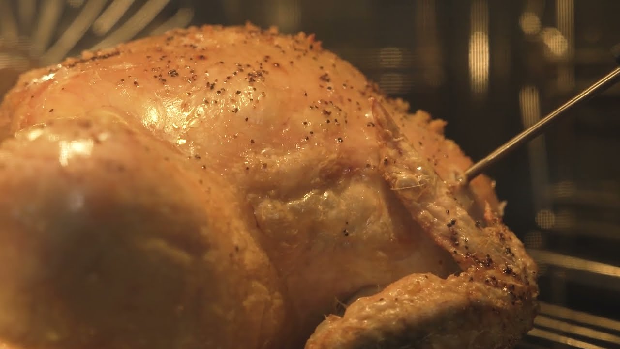 Roasting a chicken using a food sensor probe in your new AEG Rotary Dial Oven | AEG