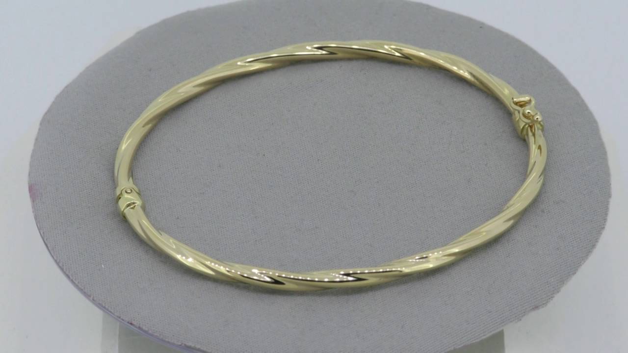 Jonc or jaune 18 carats torsad&eacute; - www.e-bijouterie.com