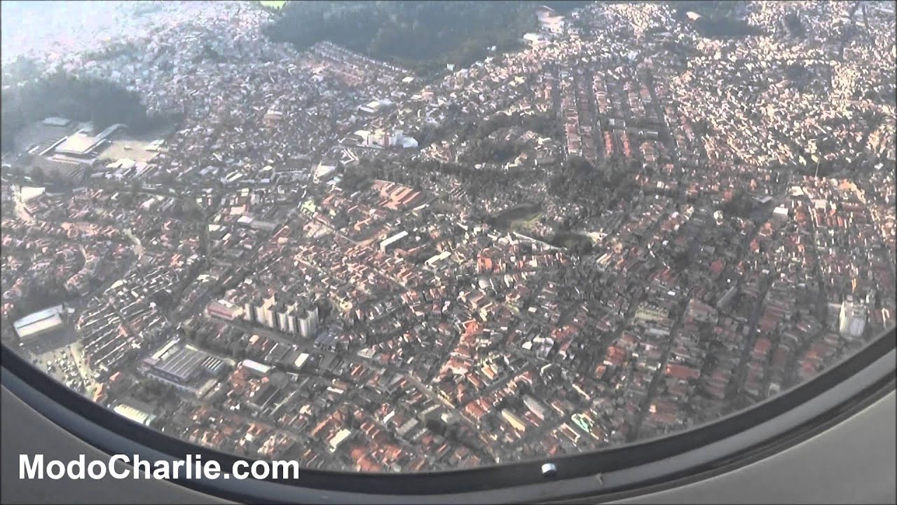 Aproximación y aterrizaje en Sao Paulo (GRU) Airbus A319 CC-AIY de SKY Airline
