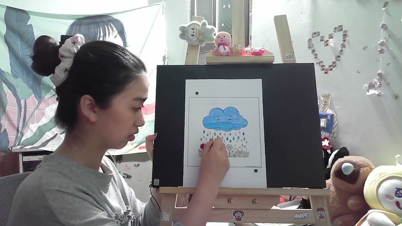 Coloring page of rain clouds watering flowers